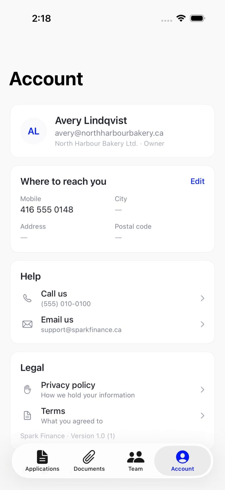 The Account tab in the Spark app showing the person's name, email and team role, and a where to reach you card with their mobile and city.